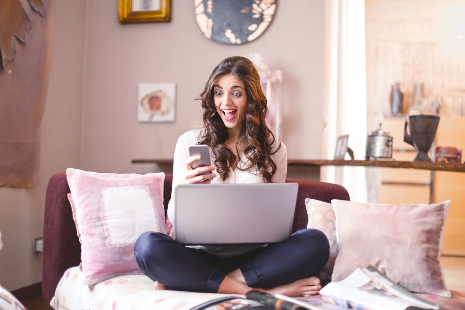 Woman Sitting While Using Cellphone